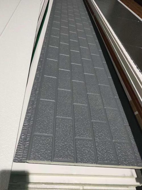 金屬雕花板外墻保溫裝飾一體板在輕鋼建筑中的應(yīng)用